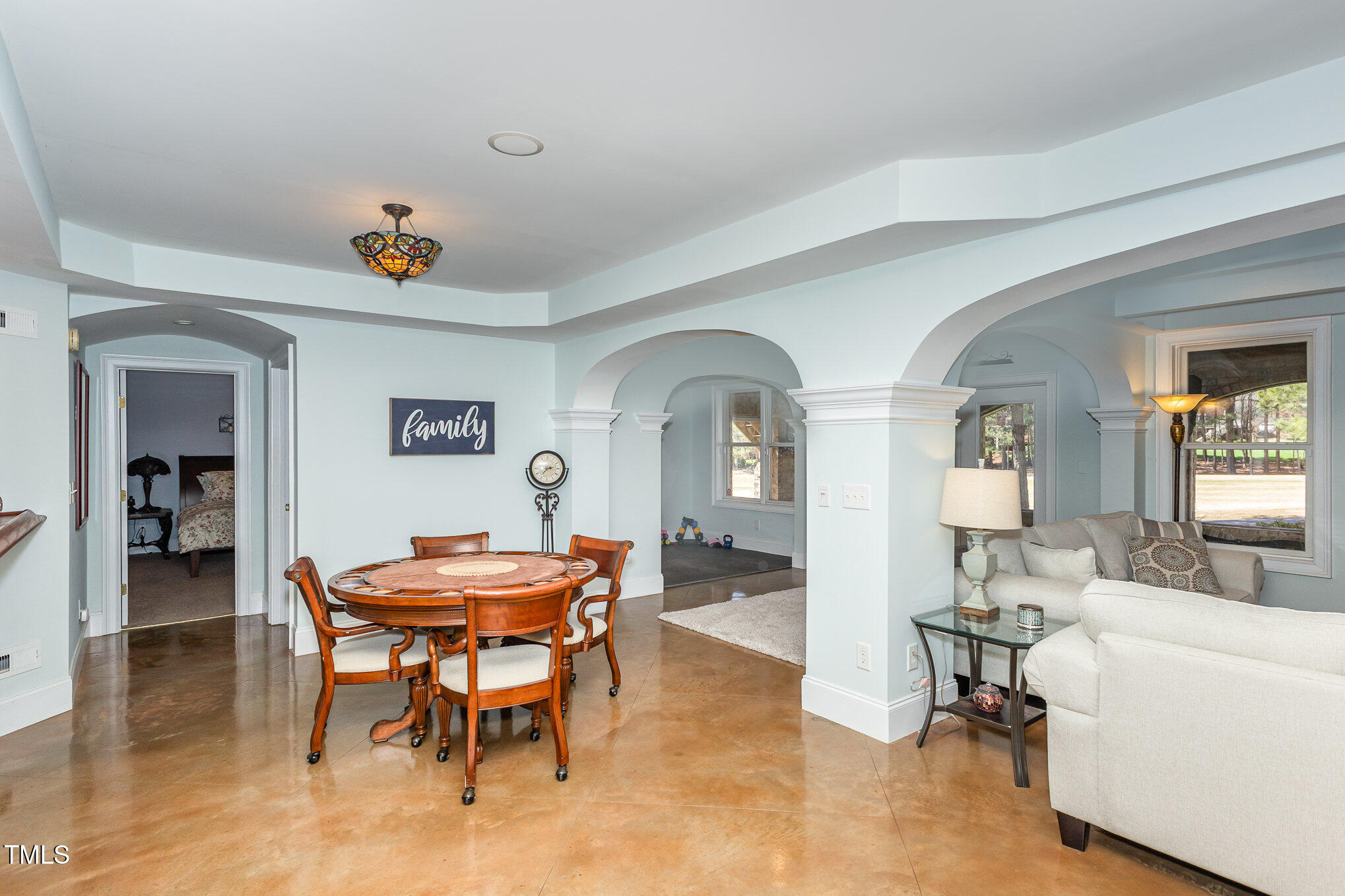 10841 Round Brook Circle Raleigh, NC 27617 - Photo 31 of 44 a dining room with furniture and wooden floor