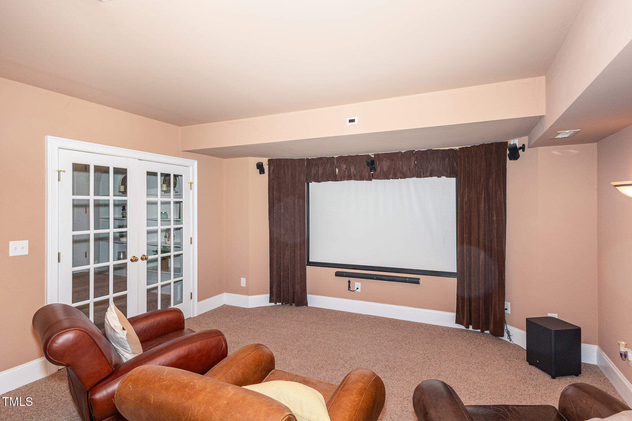 10841 Round Brook Circle Raleigh, NC 27617 - Photo 33 of 44 a living room with furniture and a flat screen tv