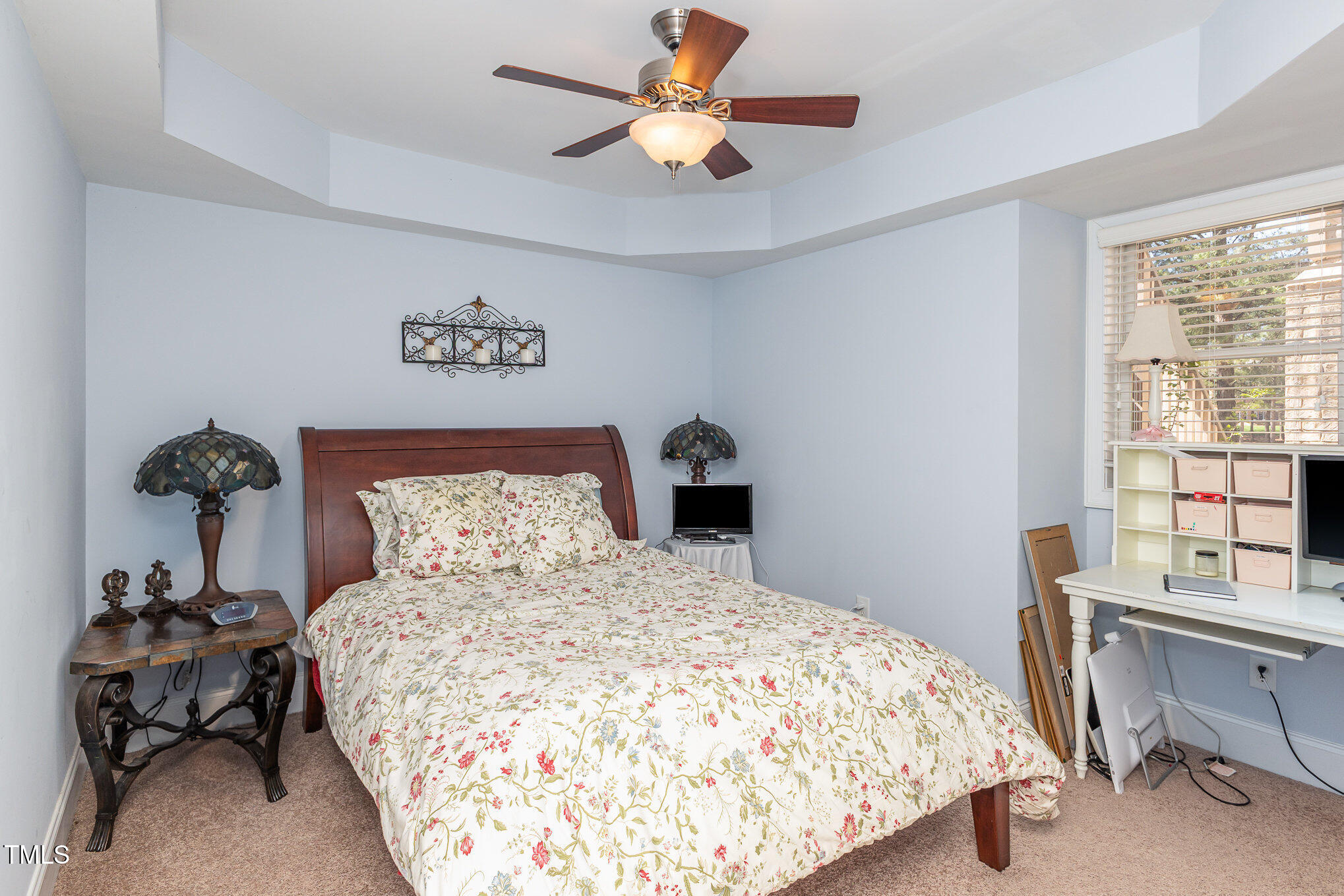 10841 Round Brook Circle Raleigh, NC 27617 - Photo 36 of 44 a bedroom with a bed and a table