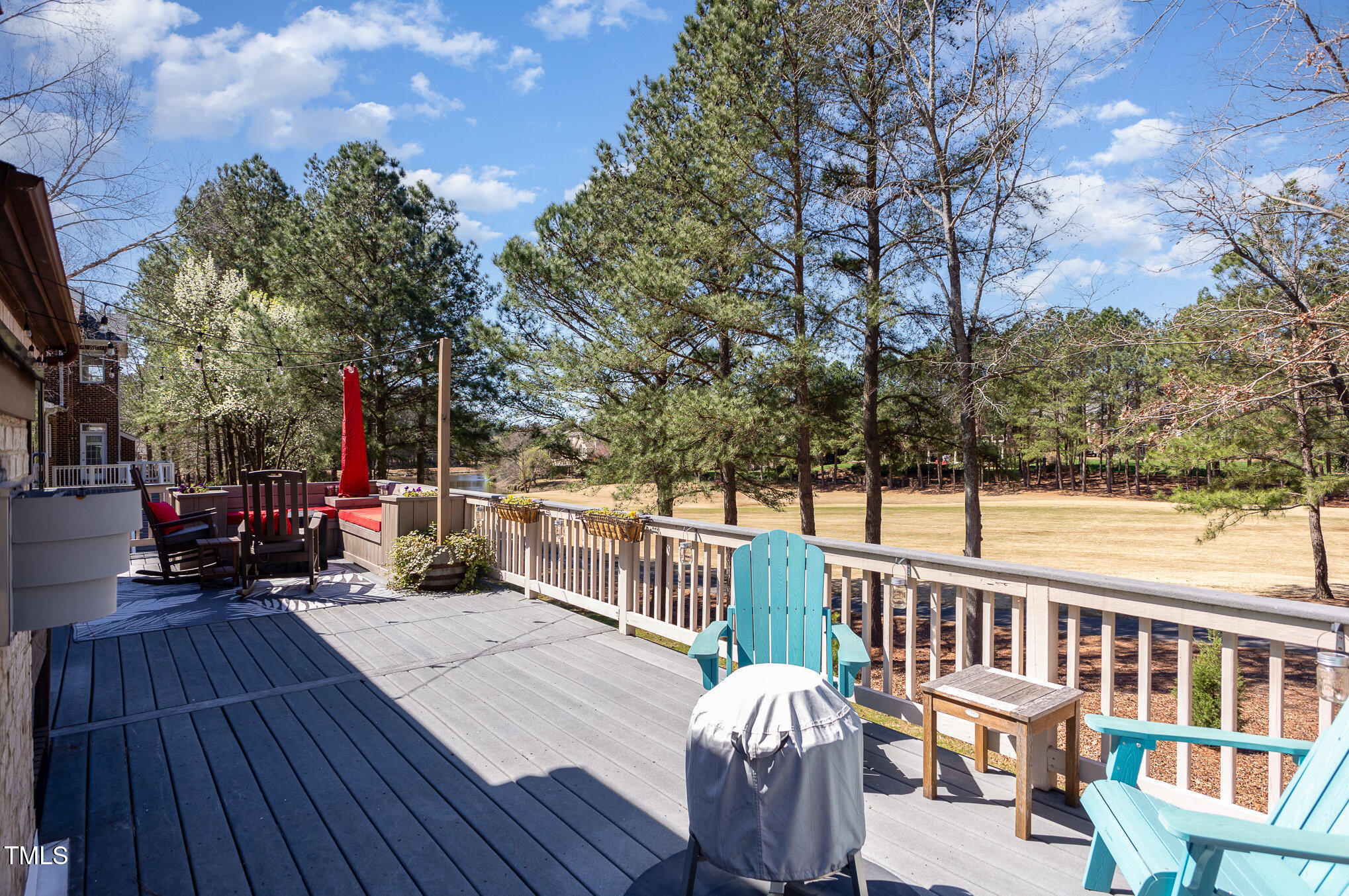 10841 Round Brook Circle Raleigh, NC 27617 - Photo 40 of 44 a view of a deck with furniture and a yard