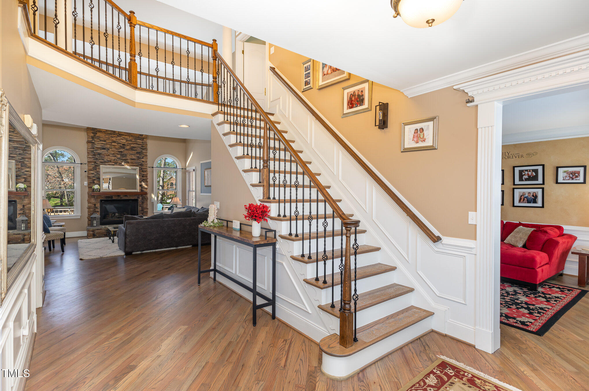 10841 Round Brook Circle Raleigh, NC 27617 - Photo 5 of 44 a view of entryway and hall with wooden floor