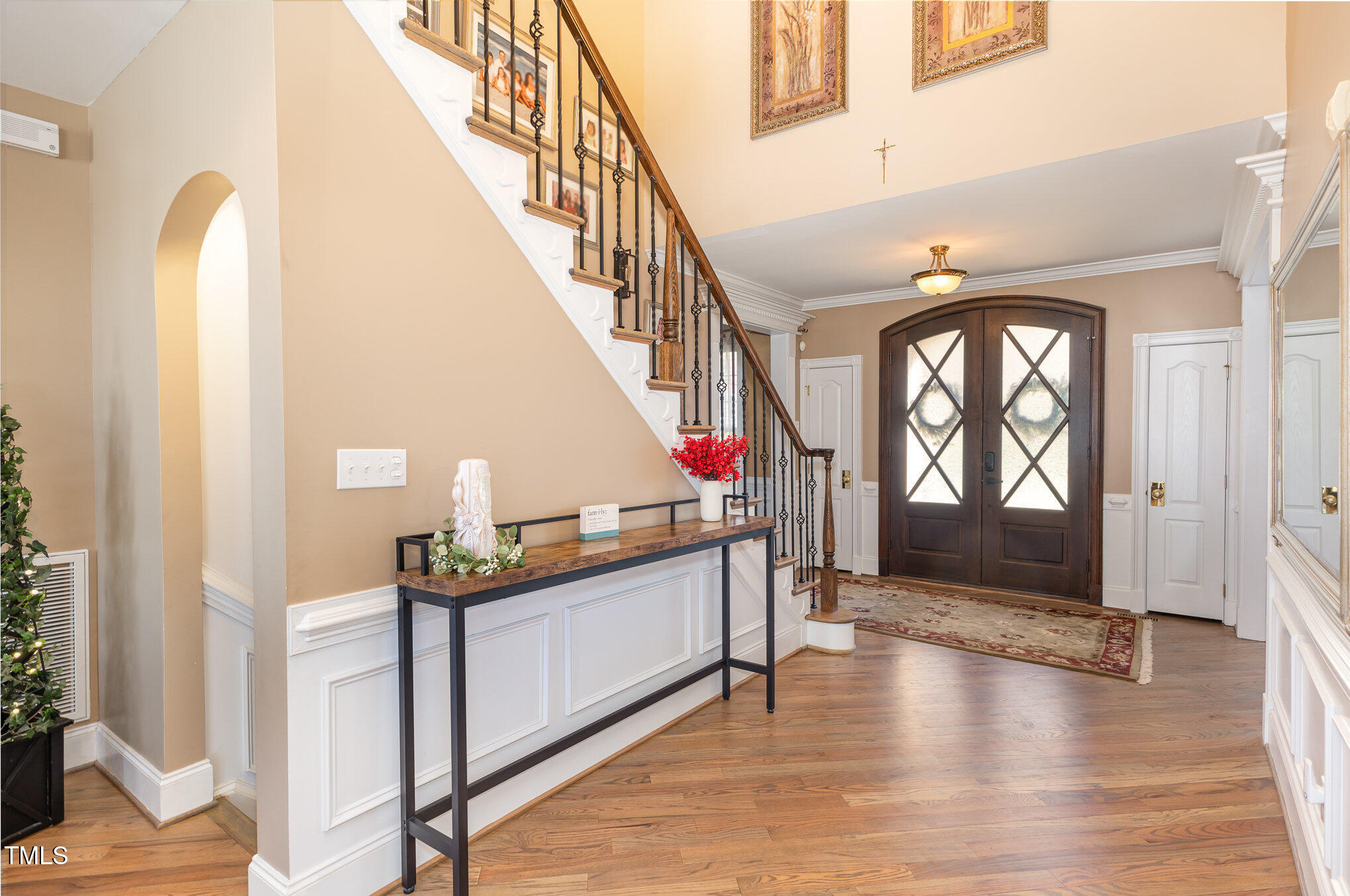 10841 Round Brook Circle Raleigh, NC 27617 - Photo 6 of 44 a view of entryway and hall with wooden floor