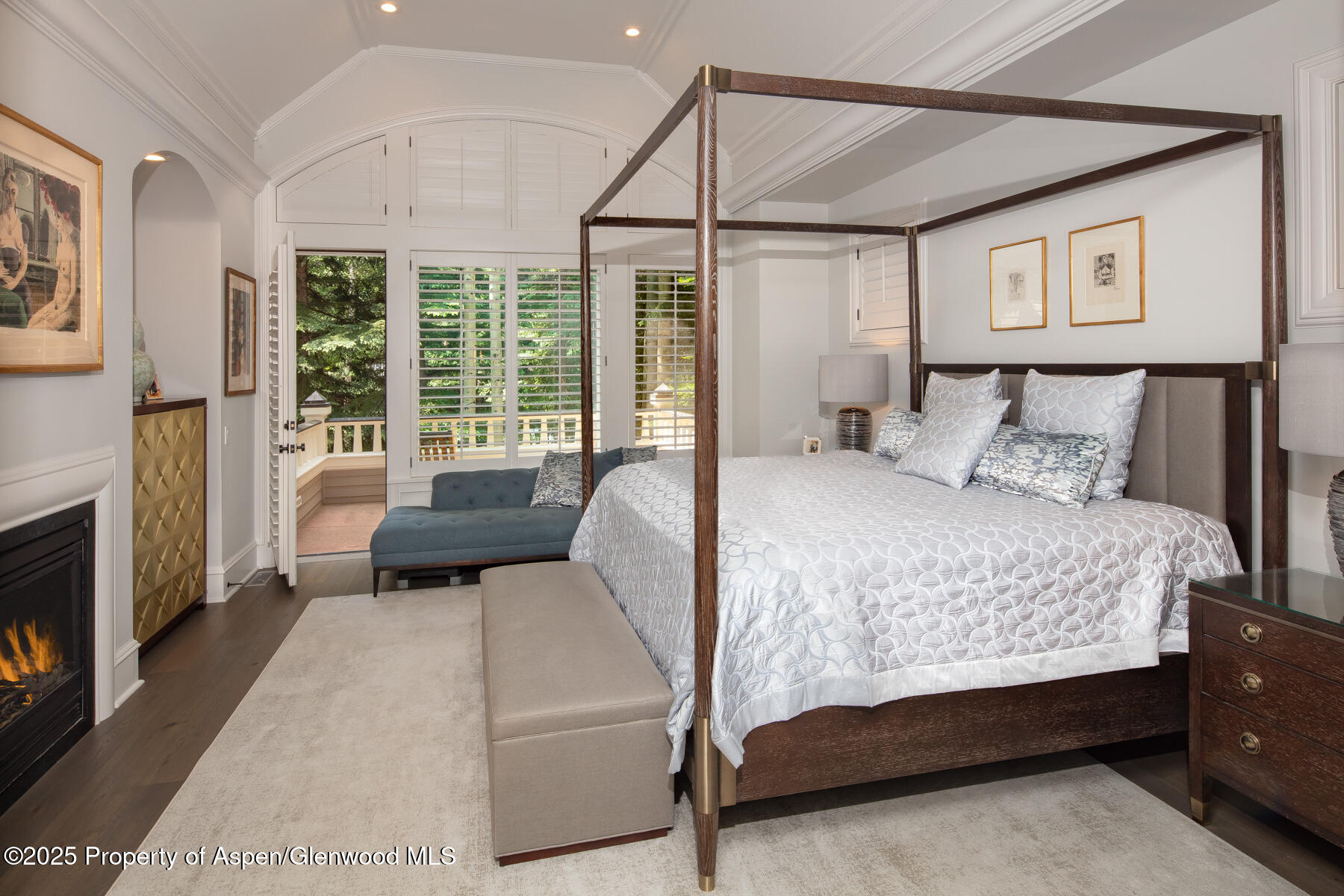 205 North 6th Street Aspen, CO 81611 - Photo 11 of 29 a bedroom with a bed and a couch