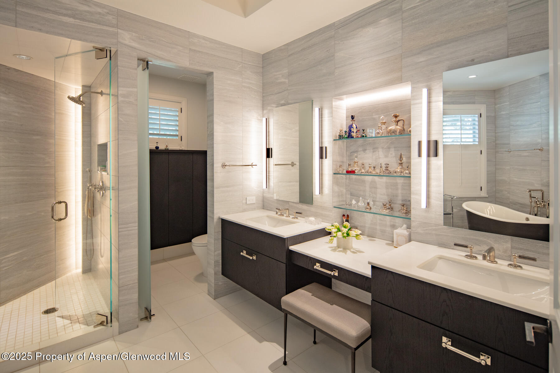 205 North 6th Street Aspen, CO 81611 - Photo 13 of 29 a bathroom with a sink double vanity granite tub shower and a mirror