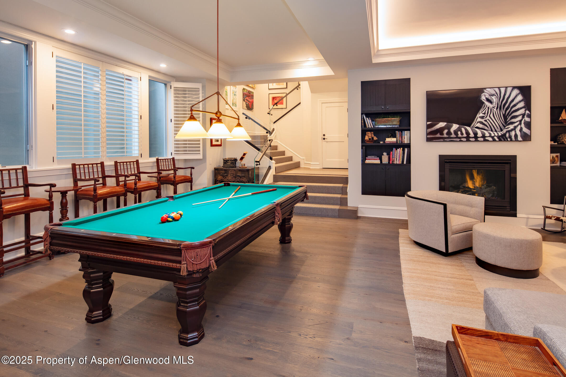 205 North 6th Street Aspen, CO 81611 - Photo 21 of 29 a room with pool table and windows