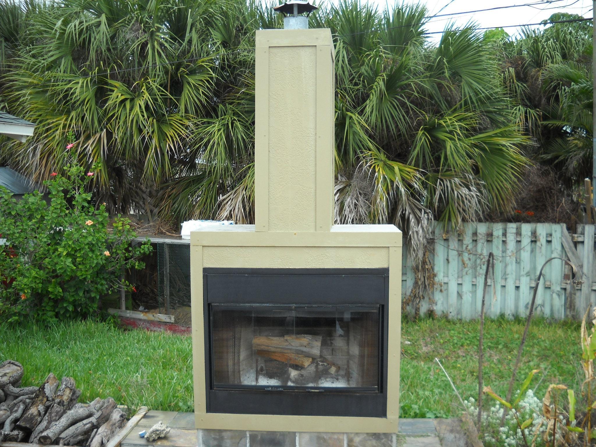 190 Sand Pine Road Indialantic, FL 32903 - Photo 19 of 21 Outdoor wood burning fireplace