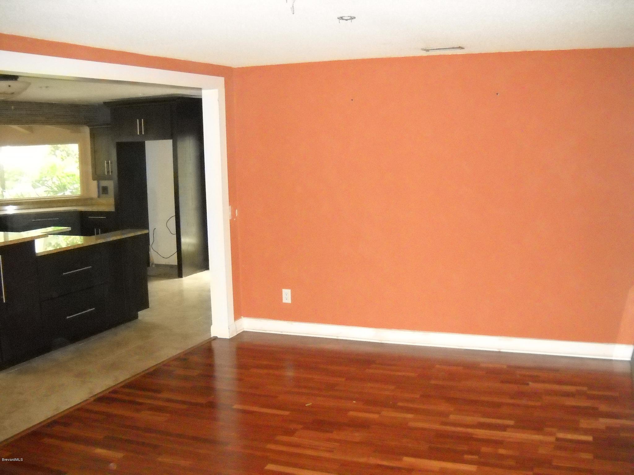 190 Sand Pine Road Indialantic, FL 32903 - Photo 21 of 21 Open floor plan & wood flooring