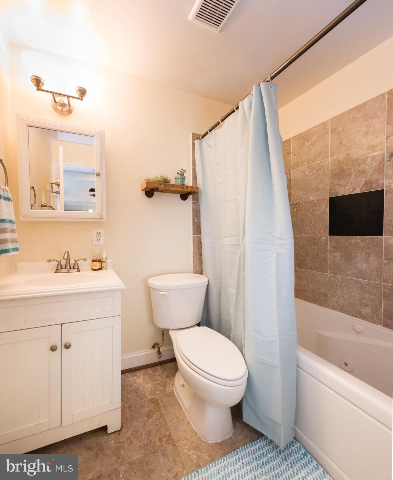 315 Evarts Street Northeast, Unit 109 Washington, DC 20002 - Photo 10 of 15 Full bath with jacuzzi tub