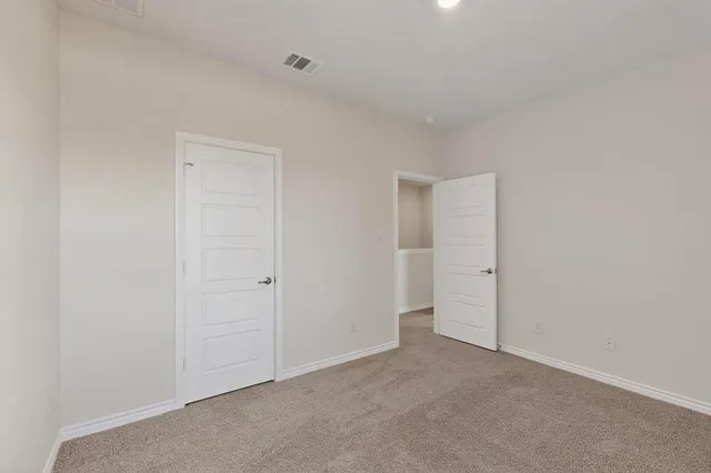 a bathroom with double sink and mirror