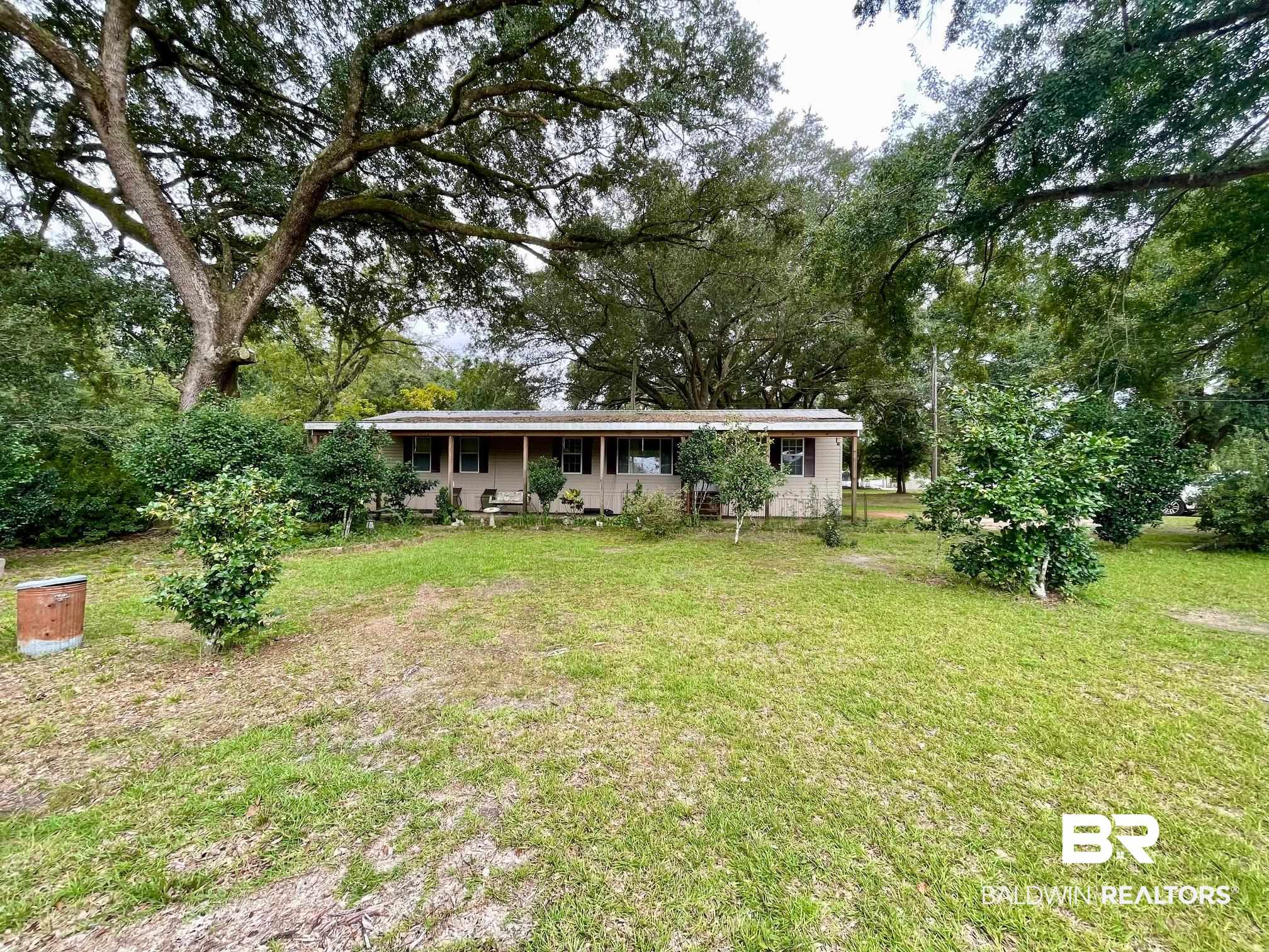 15338 Windbigler Drive Foley, AL 36535 - Photo 2 of 28 View of front of house with a front yard