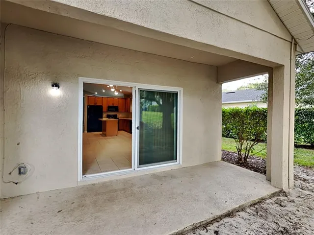 a view of a room with a large window