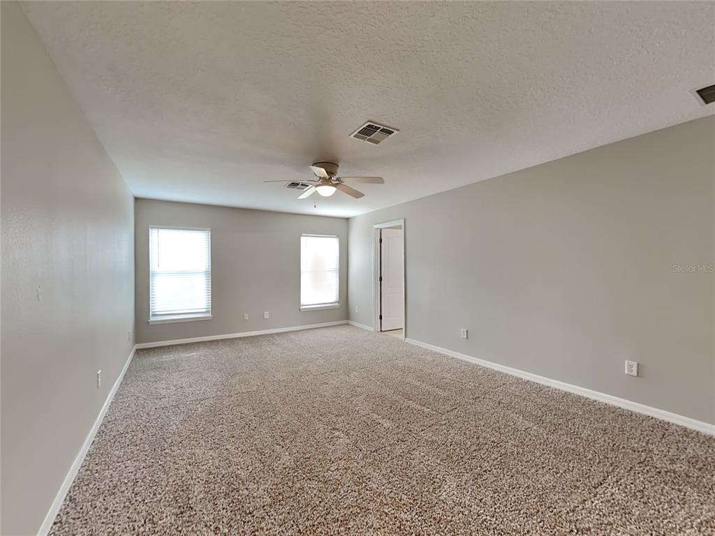 906 Summit Ash Court Deland, FL 32724 - Photo 7 of 19 a view of empty room with window