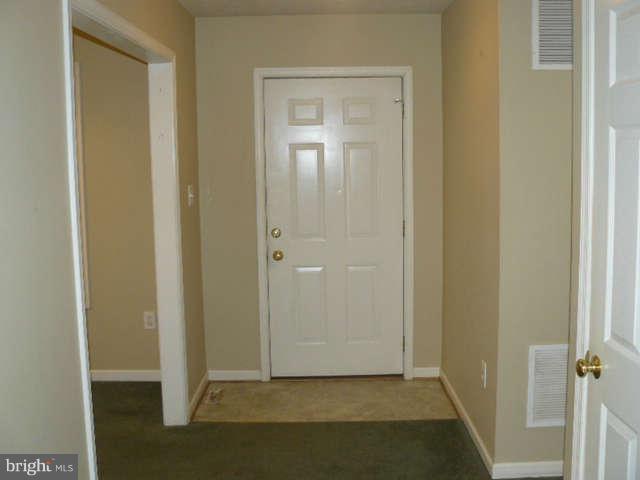 10145 Old Stillhouse Road Boston, VA 22713 - Photo 4 of 22 a view of a livingroom from a hallway