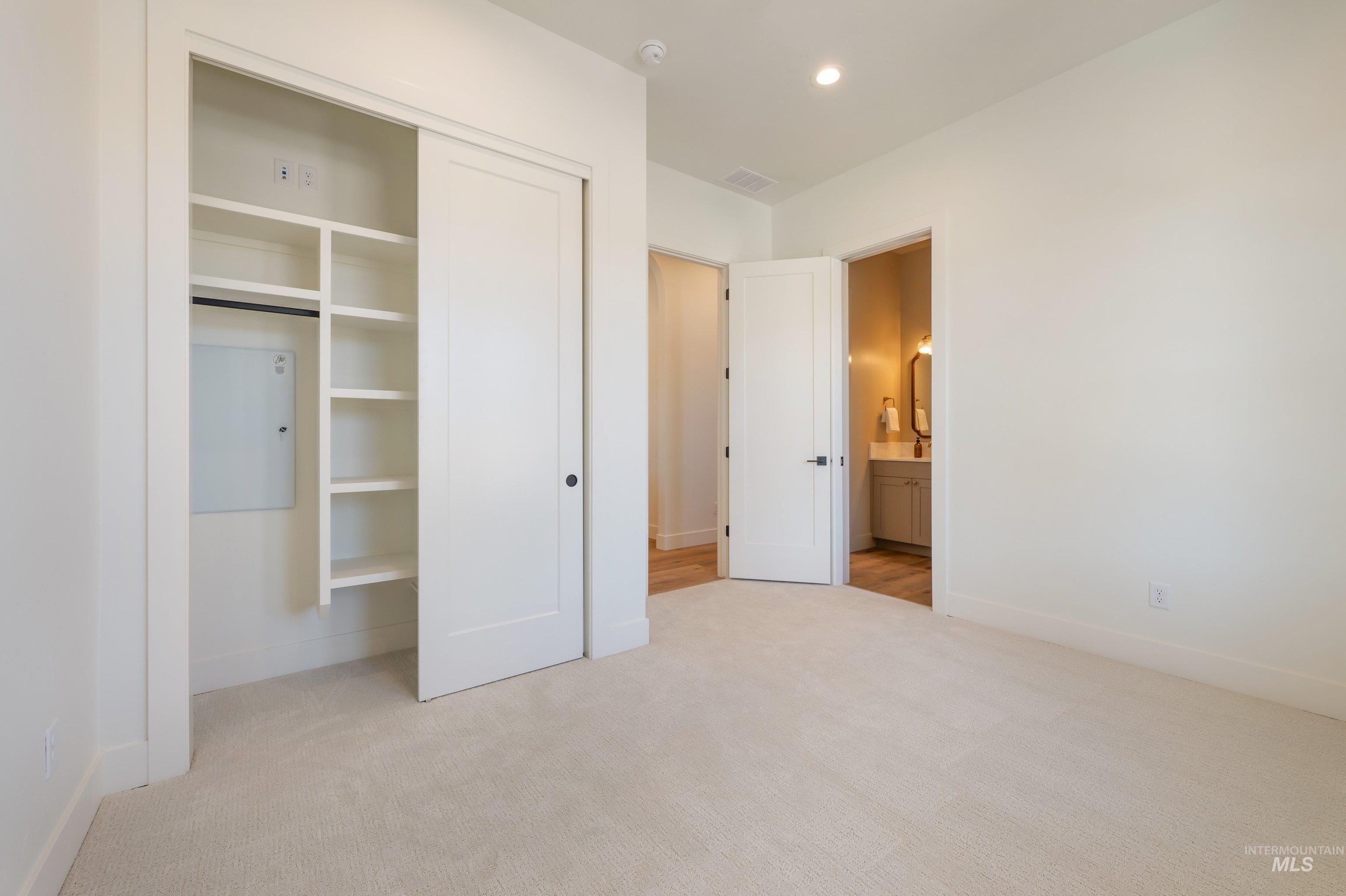 24821 Ardmore Court Caldwell, ID 83607 - Photo 27 of 43 Bright room with neutral carpeting and white walls