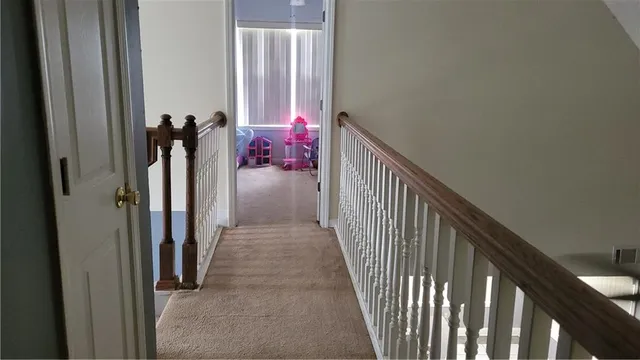 a view of a hallway to a room