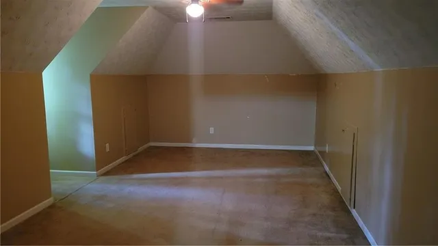 a view of a backyard of the house