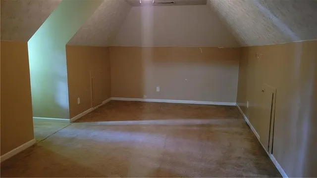 a view of a backyard of the house