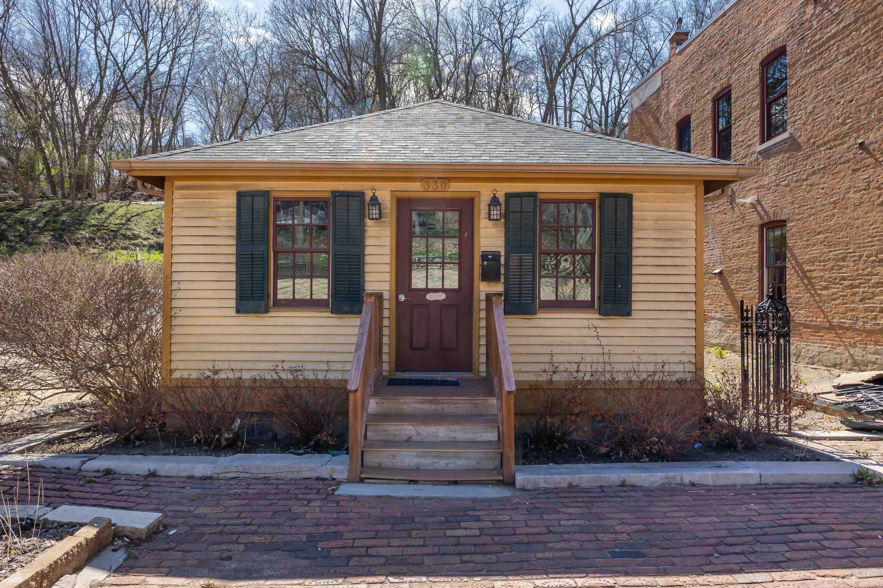330 Spring Street Galena, IL 61036 - Photo 1 of 27 a view of a house with a entrance door