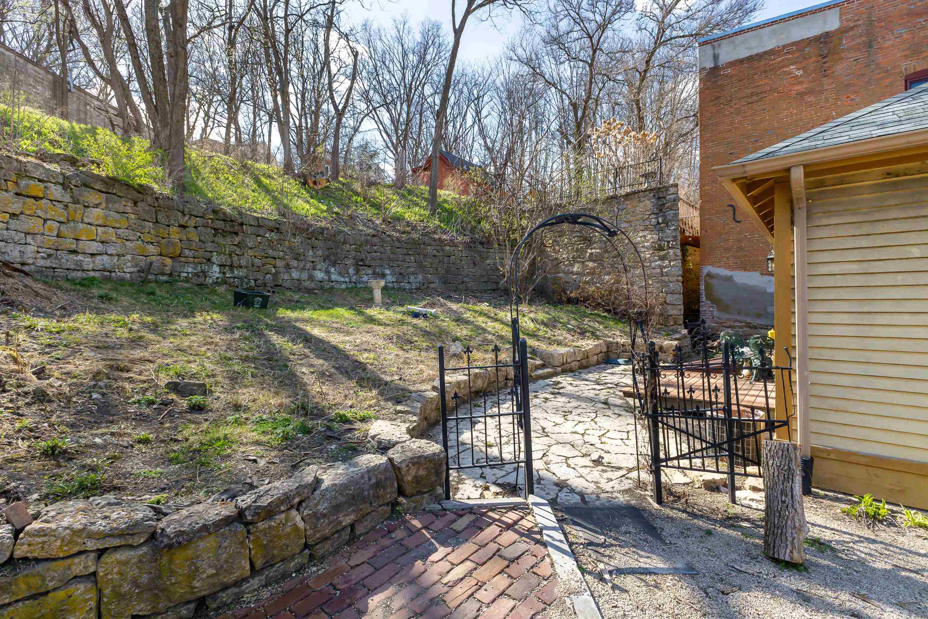 330 Spring Street Galena, IL 61036 - Photo 20 of 27 a backyard of a house with lots of green space