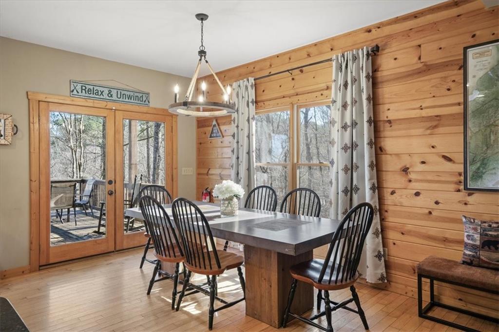 411 Gunite Circle Ellijay, GA 30540 - Photo 25 of 81 a view of a a dining room with furniture window and outside view