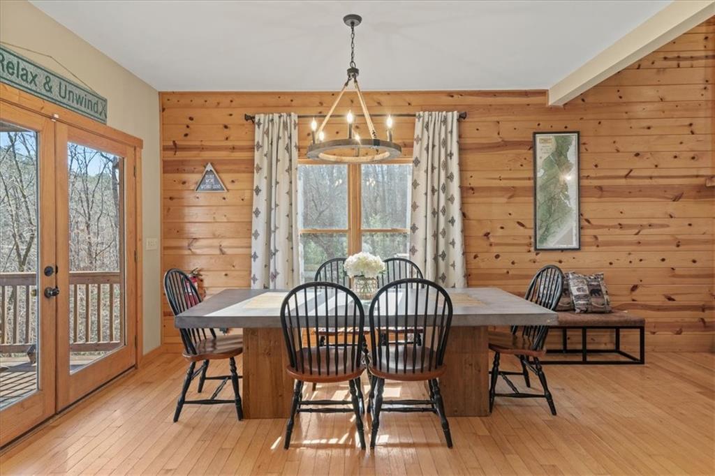 411 Gunite Circle Ellijay, GA 30540 - Photo 31 of 81 a view of a dining room with furniture window and wooden floor