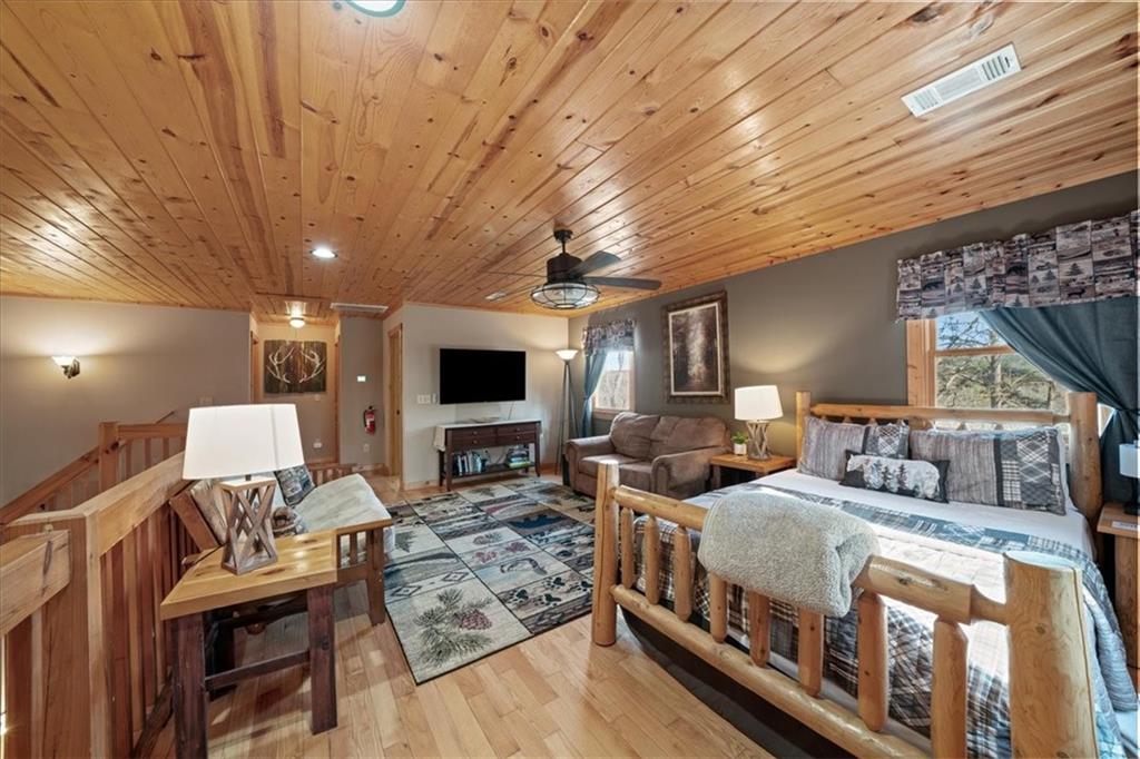 411 Gunite Circle Ellijay, GA 30540 - Photo 39 of 81 a living room with furniture and a flat screen tv