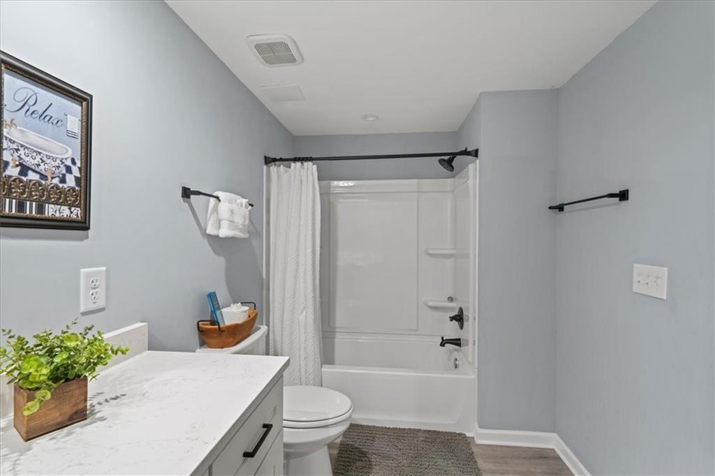 411 Gunite Circle Ellijay, GA 30540 - Photo 51 of 81 a bathroom with a sink toilet and shower