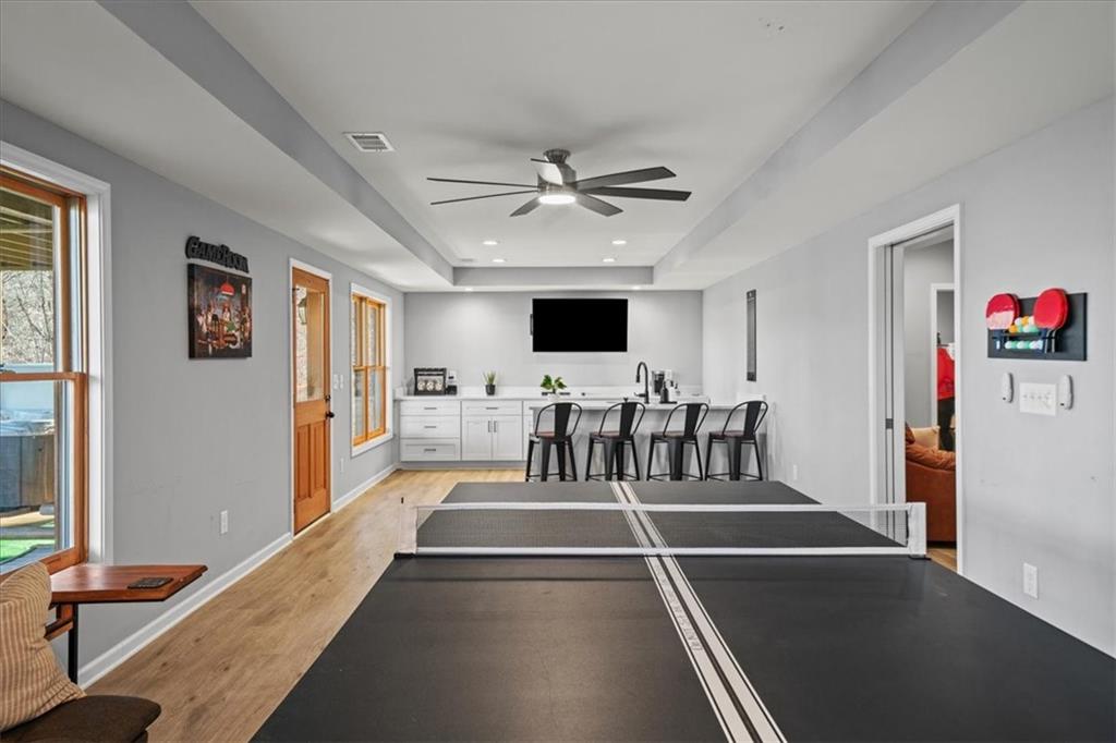 411 Gunite Circle Ellijay, GA 30540 - Photo 52 of 81 a view of a living room and a flat screen tv