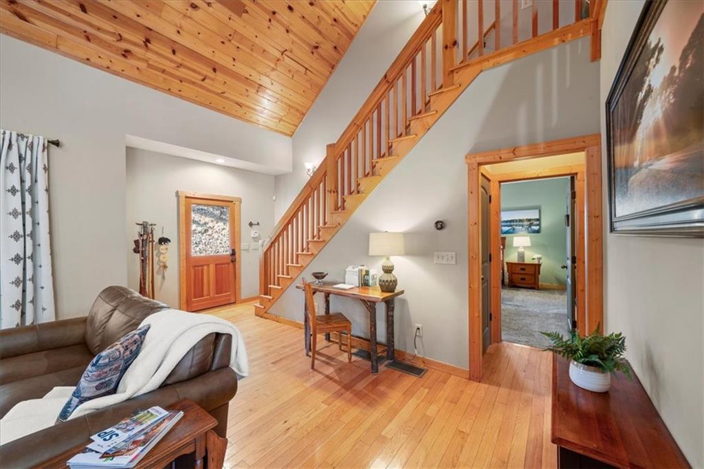 411 Gunite Circle Ellijay, GA 30540 - Photo 10 of 81 a living room with furniture and wooden floor