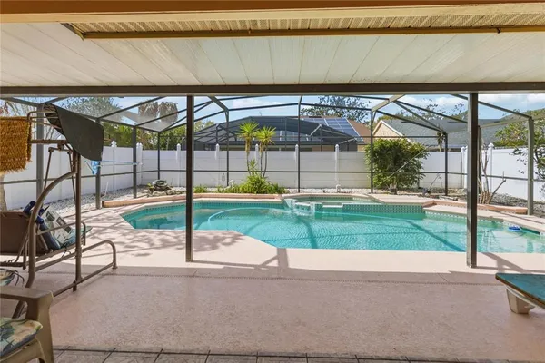 a view of yard with patio