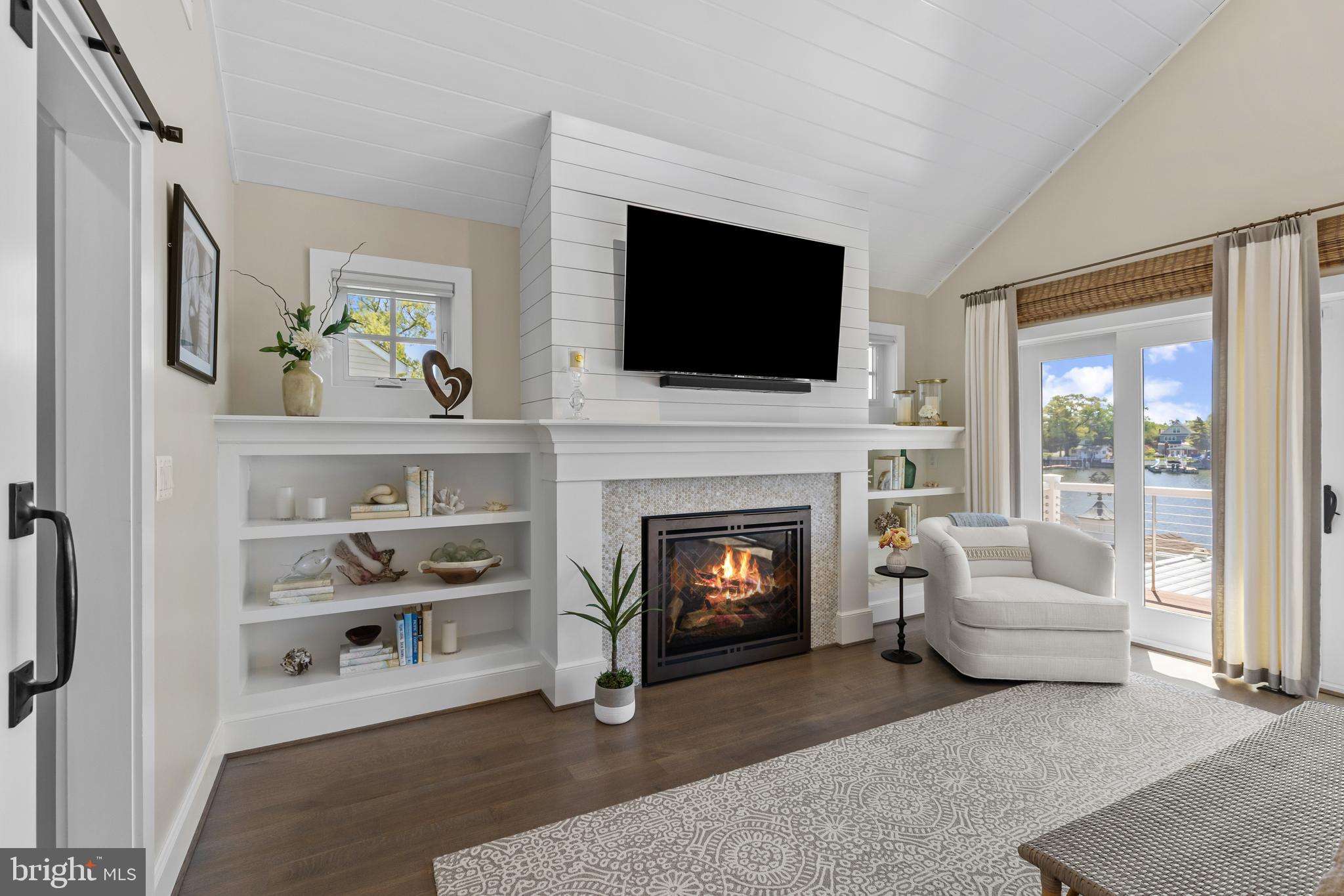 7989 East Riverside Drive Pasadena, MD 21122 - Photo 21 of 44 Primary Suite — Gas Fireplace