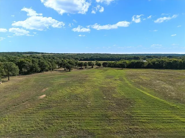 a view of an ocean and city