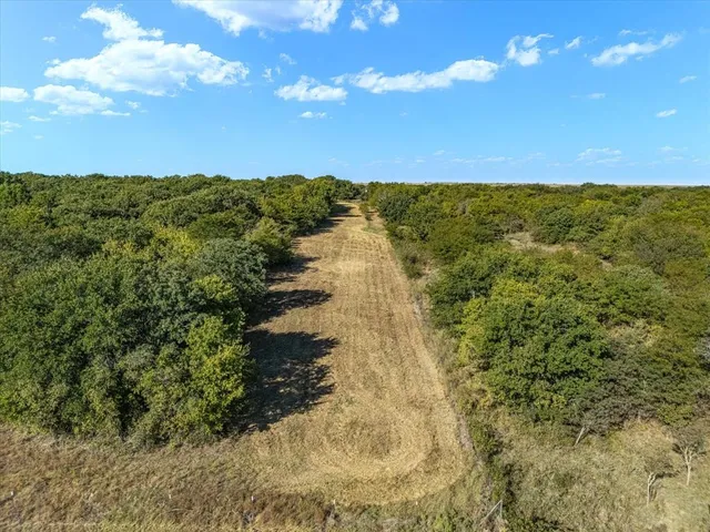a view of a street with an outdoor space