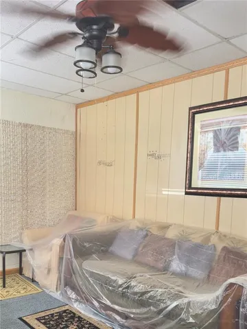 a bathroom with a granite countertop bathtub and shower
