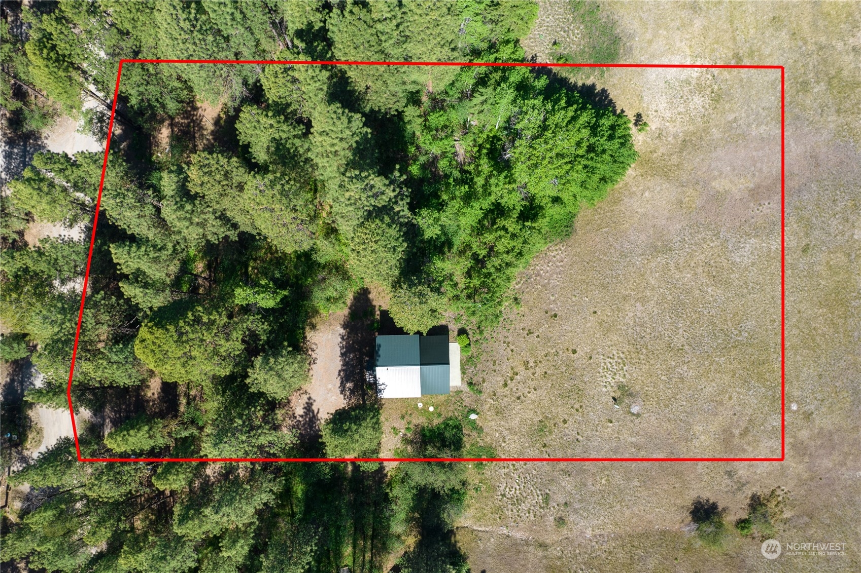 81 Homestead Road Winthrop, WA 98862 - Photo 11 of 39 an aerial view of a house with a yard