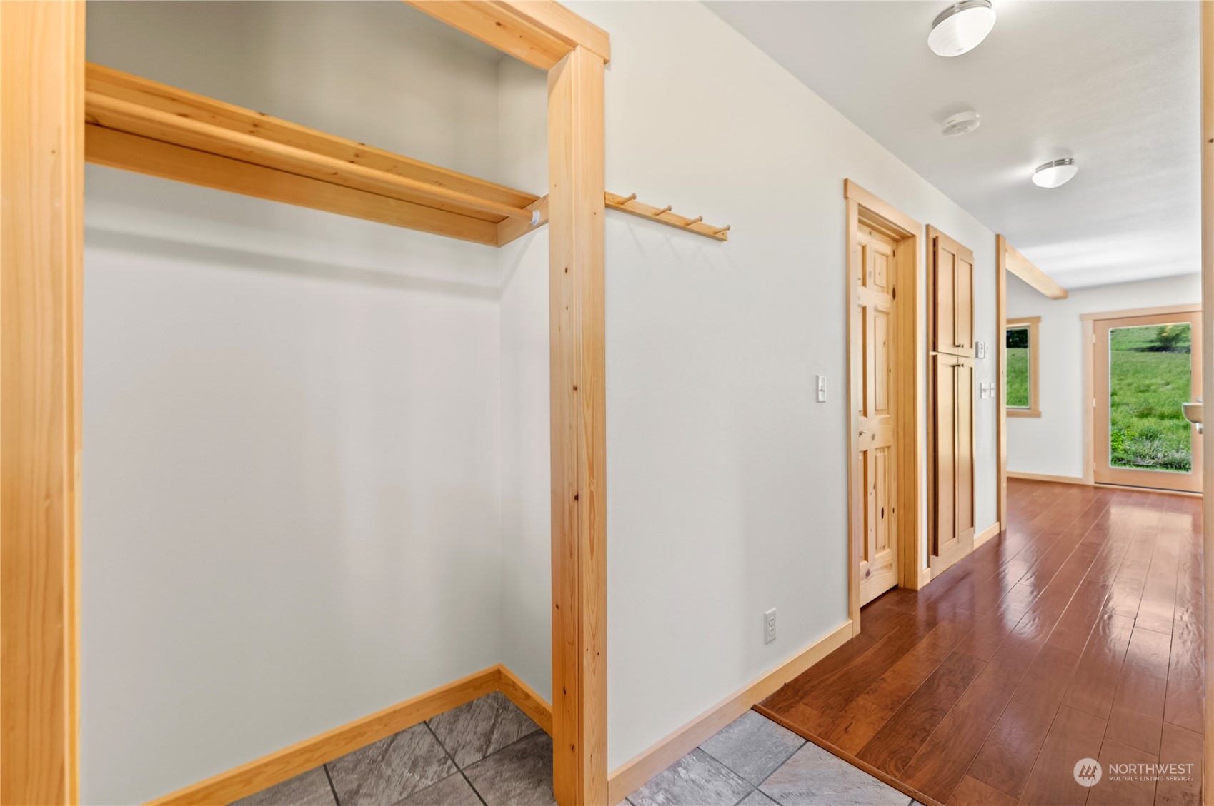 81 Homestead Road Winthrop, WA 98862 - Photo 14 of 39 a view of a hallway with wooden floor
