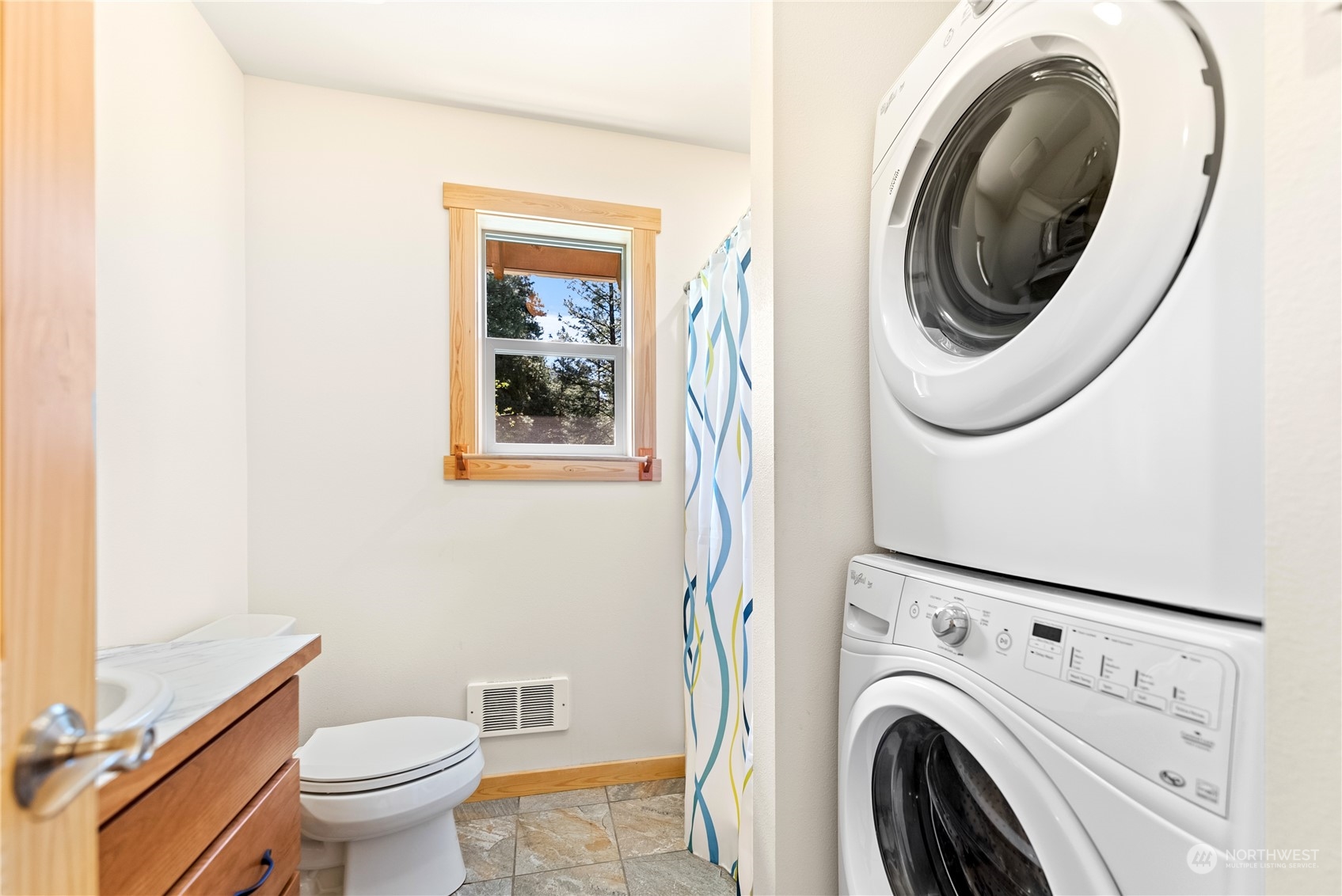 81 Homestead Road Winthrop, WA 98862 - Photo 15 of 39 a view of a hallway with washer and dryer