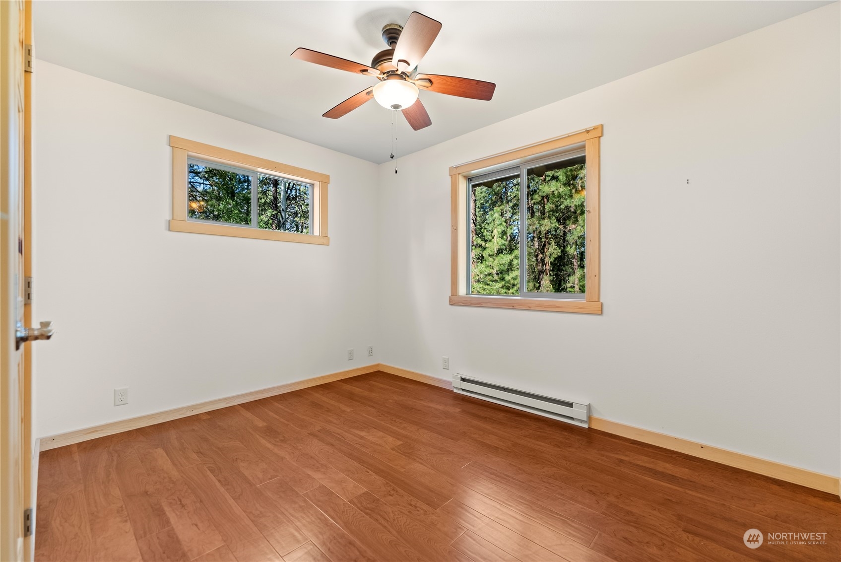 81 Homestead Road Winthrop, WA 98862 - Photo 17 of 39 an empty room with a window and a ceiling fan