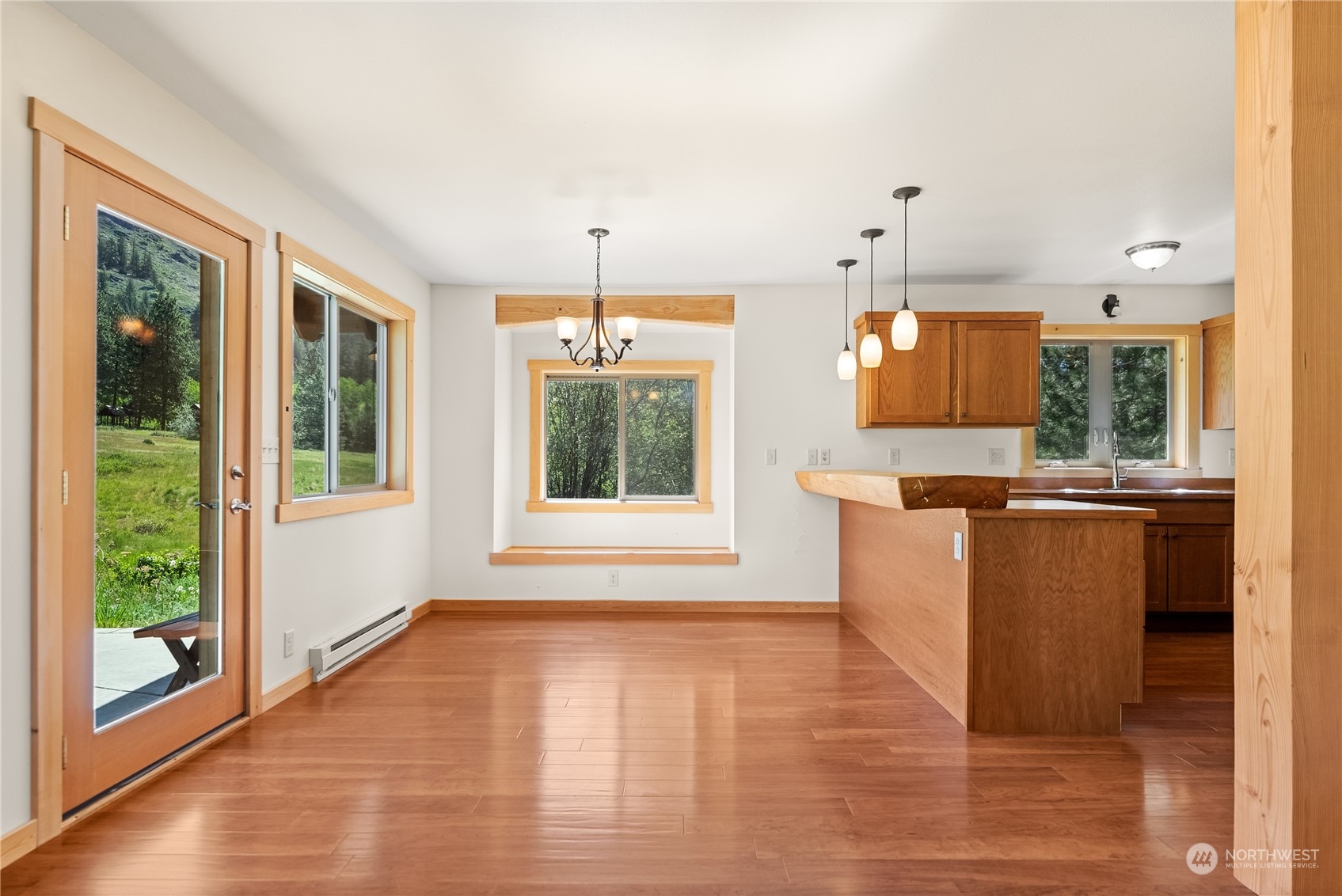 81 Homestead Road Winthrop, WA 98862 - Photo 21 of 39 a view of kitchen with granite countertop window and front door