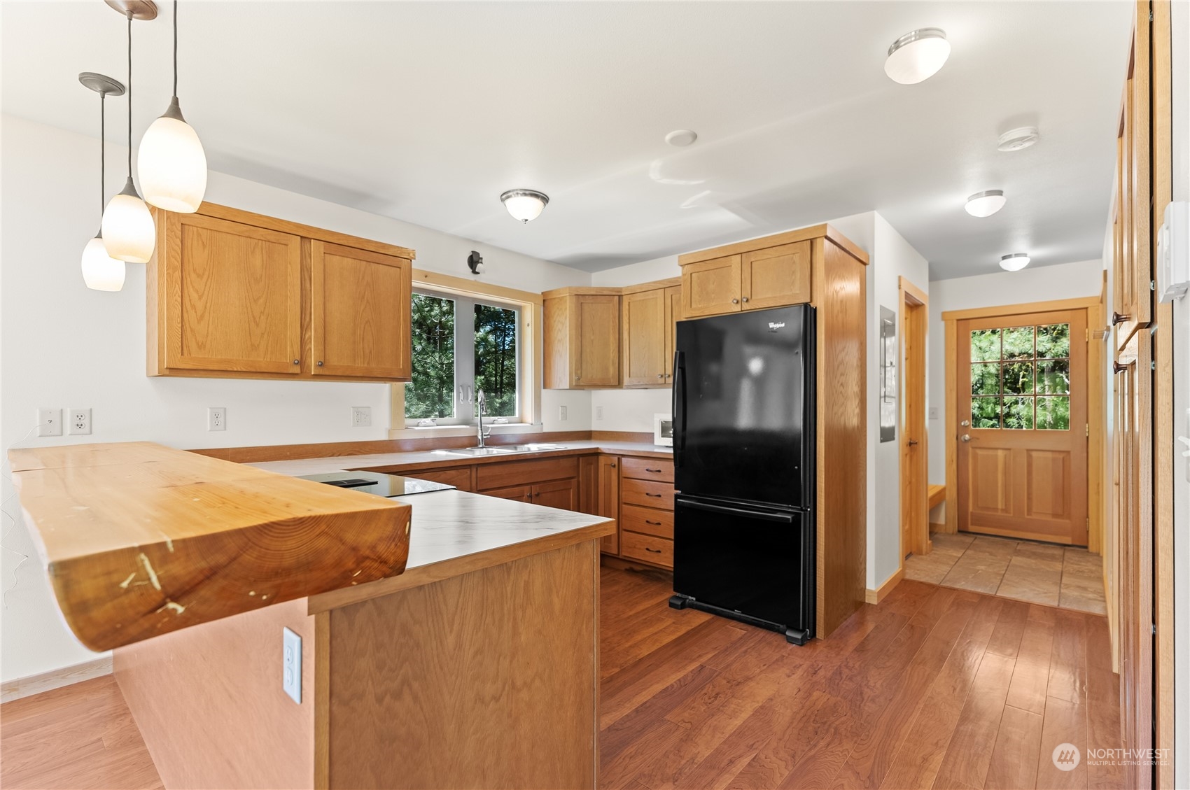 81 Homestead Road Winthrop, WA 98862 - Photo 26 of 39 a kitchen with stainless steel appliances granite countertop a refrigerator and a sink