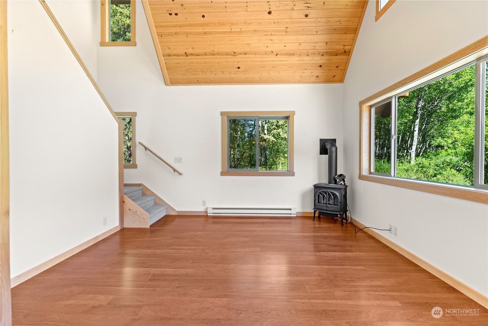 81 Homestead Road Winthrop, WA 98862 - Photo 29 of 39 a view of an entryway with wooden floor and windows
