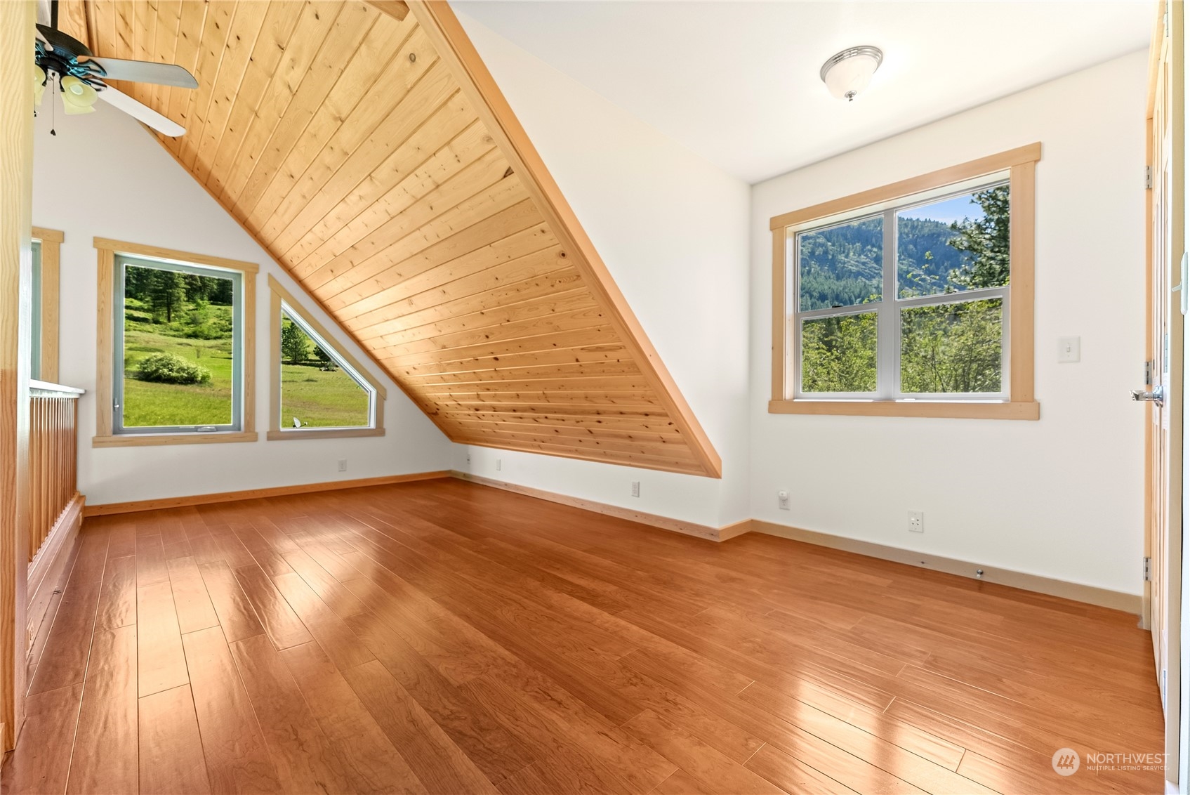 81 Homestead Road Winthrop, WA 98862 - Photo 30 of 39 a view of an entryway with wooden floor and a window