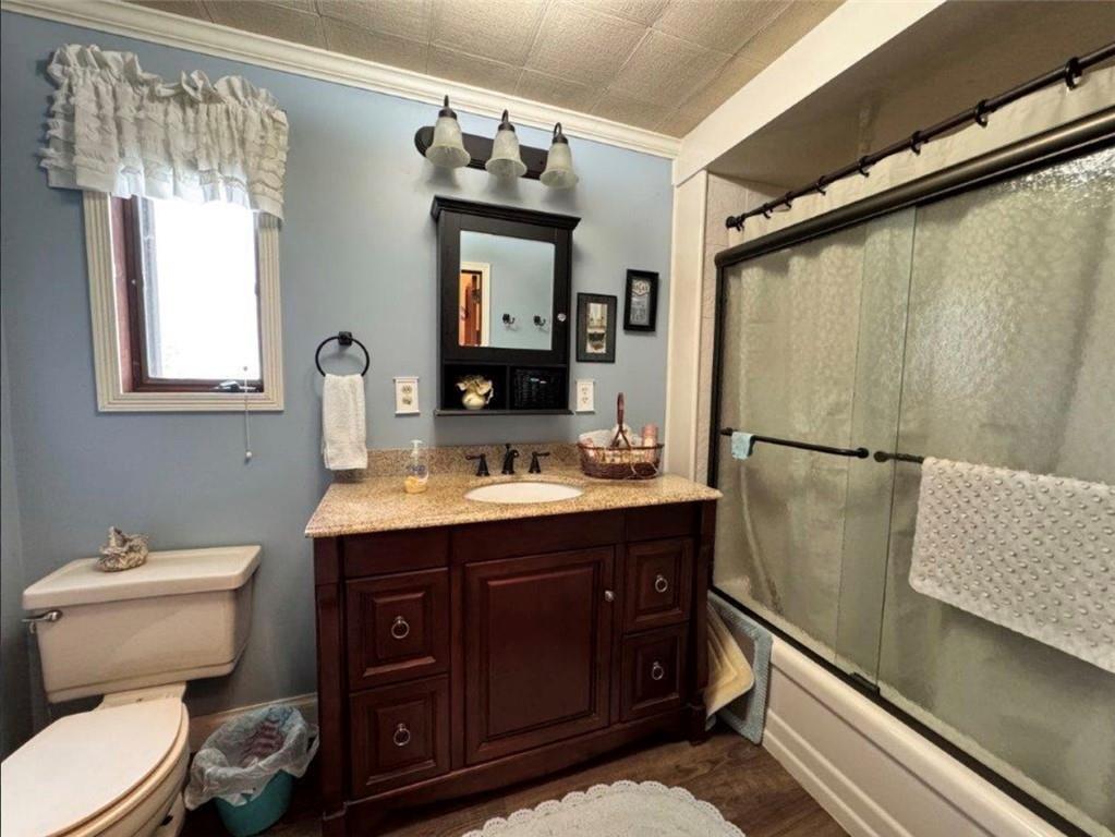 668 Highway 536 Mayport, PA 16240 - Photo 12 of 26 a bathroom with a toilet sink and mirror