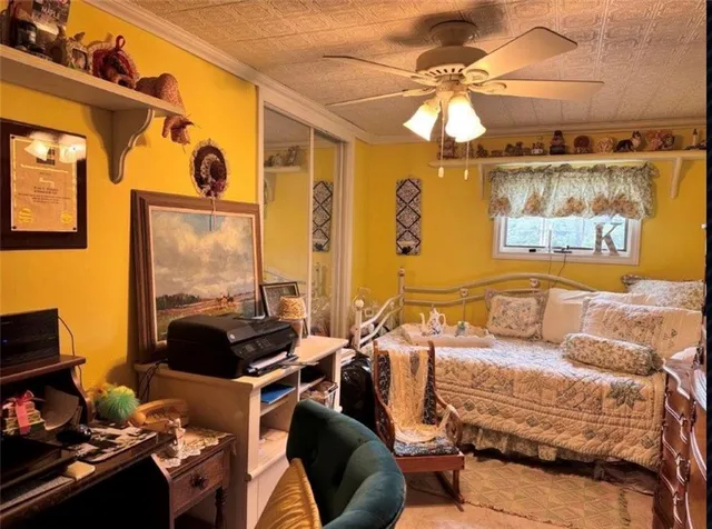 a living room with furniture fireplace and a window