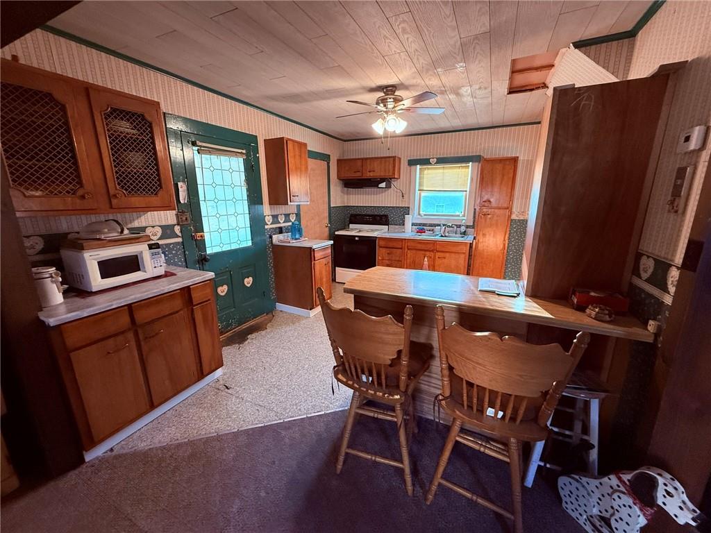 668 Highway 536 Mayport, PA 16240 - Photo 19 of 26 a view of a dining room with furniture window and wooden floor