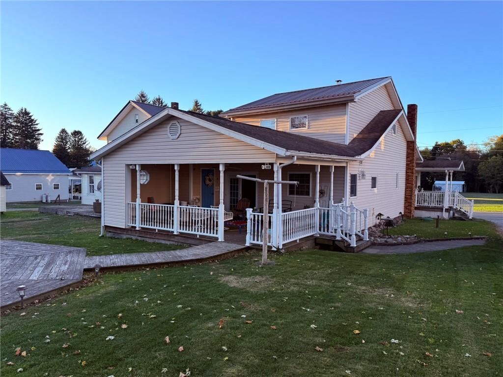 668 Highway 536 Mayport, PA 16240 - Photo 3 of 26 a front view of a house with a yard table and chairs