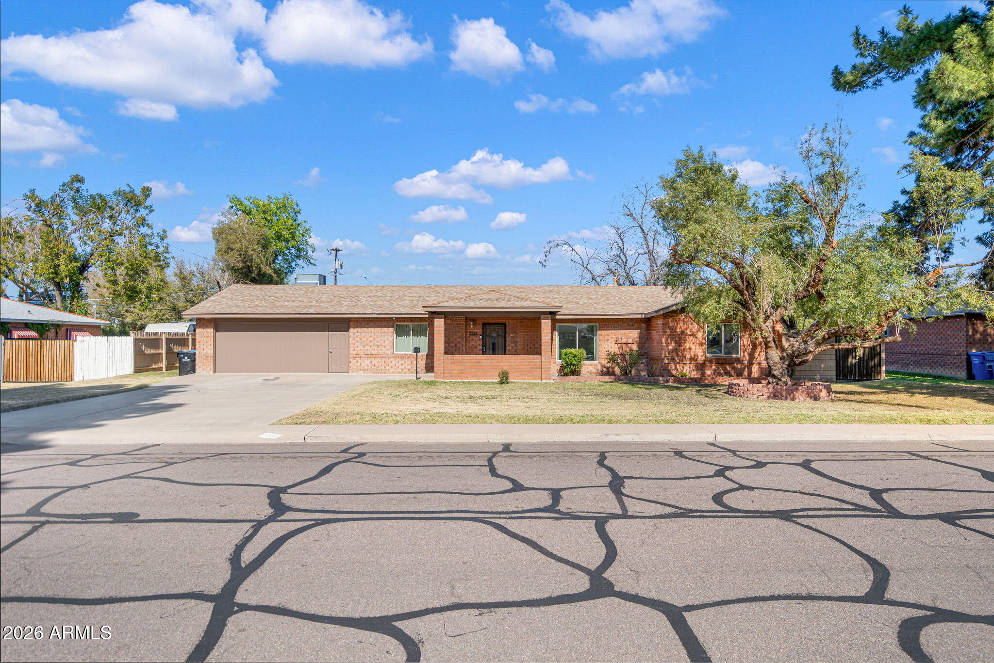 2226 East Fairmount Avenue Phoenix, AZ 85016 - Photo 1 of 4 a view of a house with pool and a yard