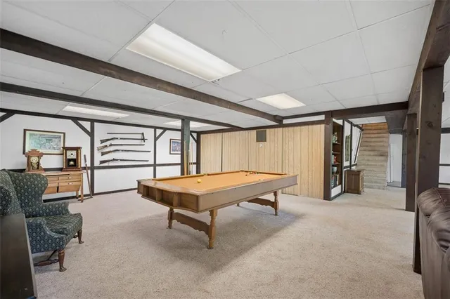 a room with table and chairs