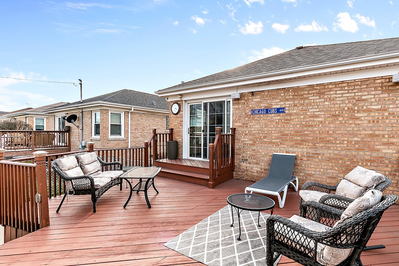 4031 Custer Avenue Lyons, IL 60534 - Photo 3 of 19 a balcony with furniture and wooden floor