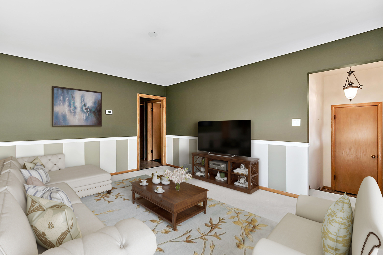 4031 Custer Avenue Lyons, IL 60534 - Photo 5 of 19 a living room with furniture and a flat screen tv